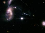 Collision galaxies naines photographiée télescopes Hubble Spitzer