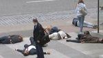 flashmob intriguant passants tombent raident mort dans video